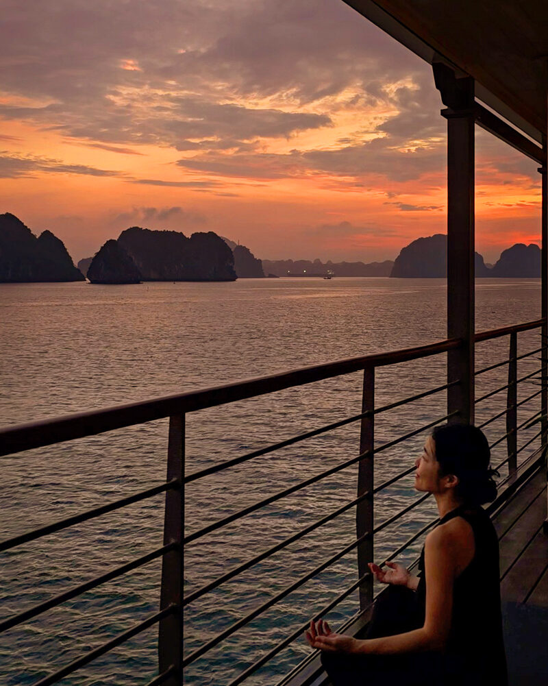 Korean creator experiencing a shareable moment on a Ha Long cruise